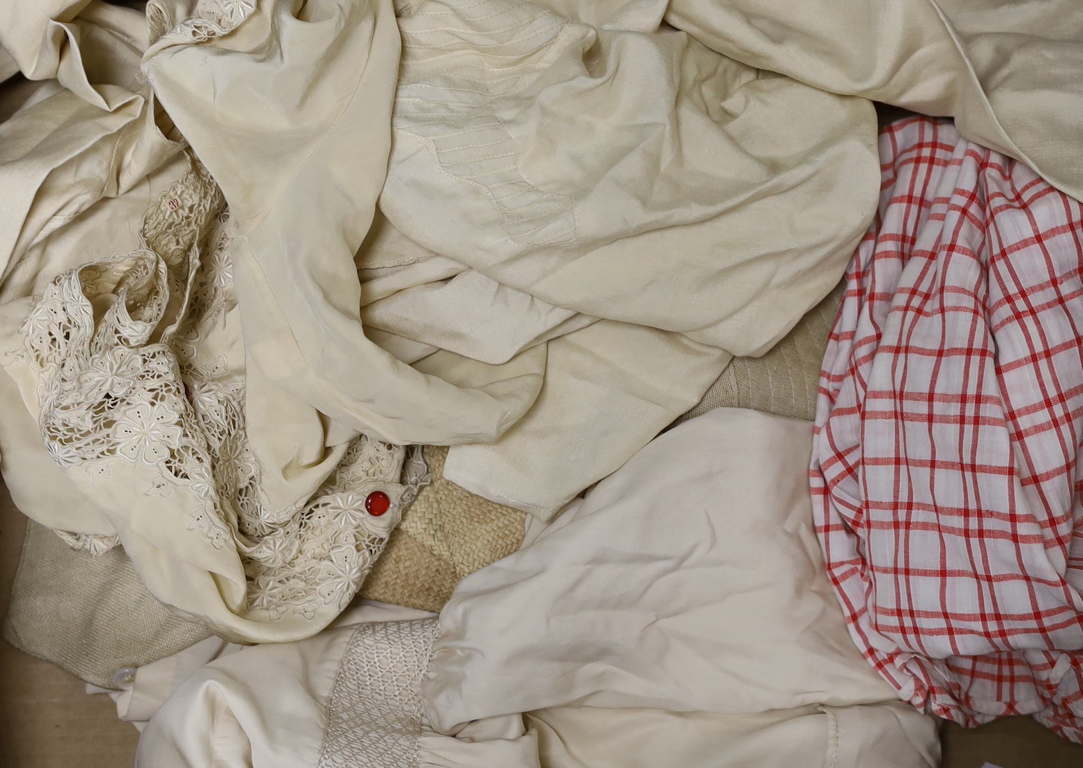 A silk smock, two silk embroidered blouses, a red check 1920's dress, a linen waistcoat and two cloche hats, etc.
